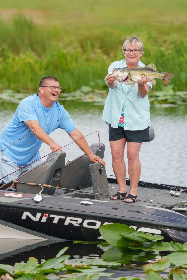 Happy-fishing-couple-3200-with-10-lb-largemout-bass-_DSC1494-Indian-Lake-Estates-FL-33855-Enhanced-NR